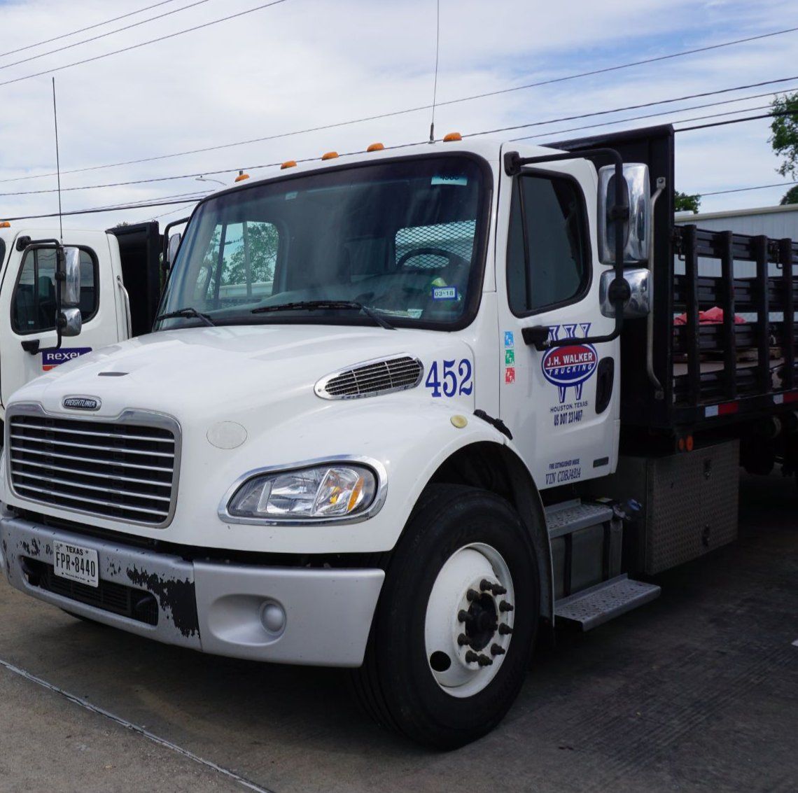 Dedicated stakebed truck ready for a route
